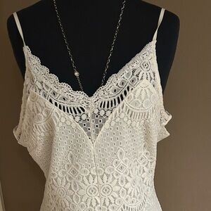 White lace women’s sexy dress with straps. Size Large.